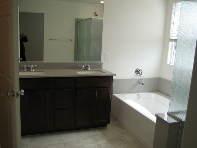 Building Photo - Beautiful 3 Bd, 2.5 bt Two Story home in a gated community with 2 car garage.