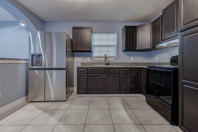 Building Photo - 7118 Karen St