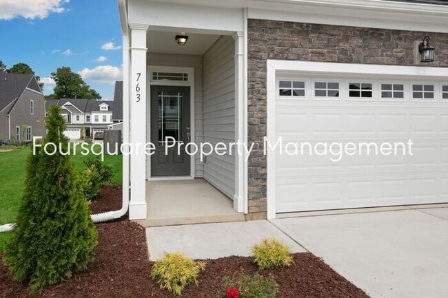 Building Photo - Bright 3-Bed 2.5-Bath End-Unit Townhome with Washer/ Dryer, Granite Kitchen & 2-Car Garage.Conven...