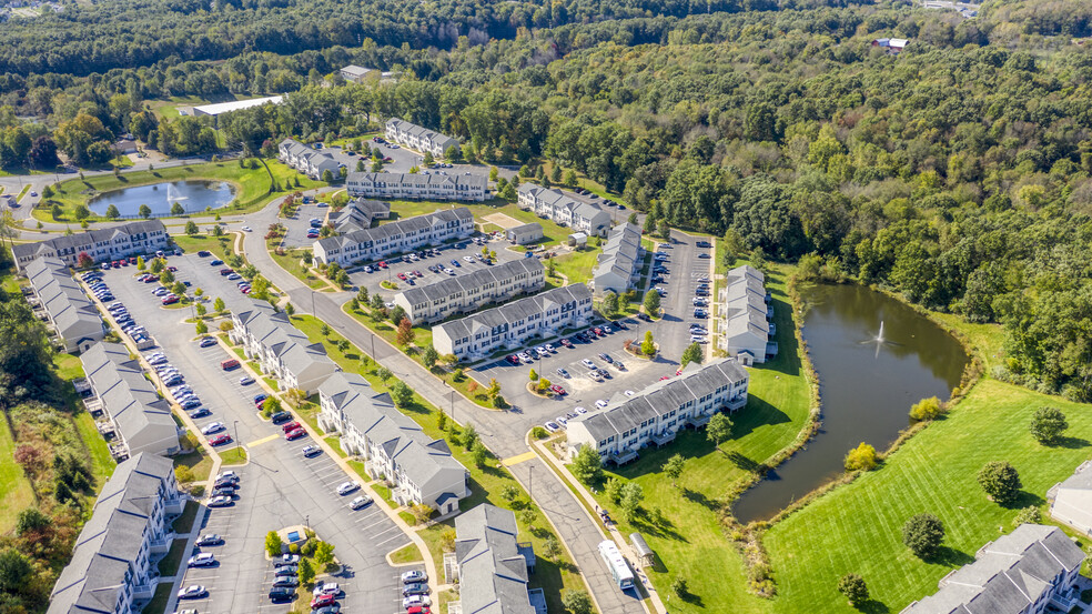 Building Photo - The Paddock Apartment Homes