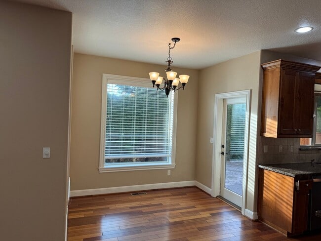 Building Photo - Goregous 5 Bedroom Home! Great Location! Vaulted Ceilings! Fenced Yard! 3- Car Garage & More!