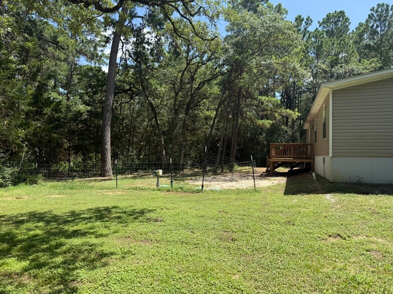 Backyard fenced in - 380 Pine Tree Loop