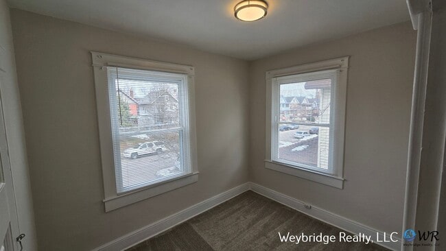 Building Photo - Charming 3BR Home in Norwood with Fenced Yard, Detached Garage & Workshop – Prime Location!