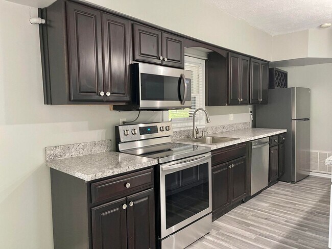 Building Photo - Move-In March & Get 50% Off Your First Month! Charming 2-Bed Northside Home!