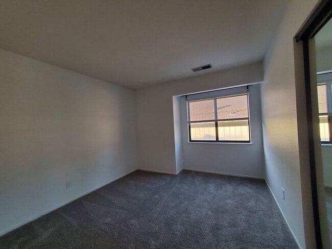 Building Photo - Update 2x2 Top Floor Condo with pool, storage, fireplace & garage in ideal Novato Location