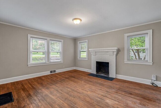 Building Photo - Adorable Home, Just Painted, Wood Flooring...