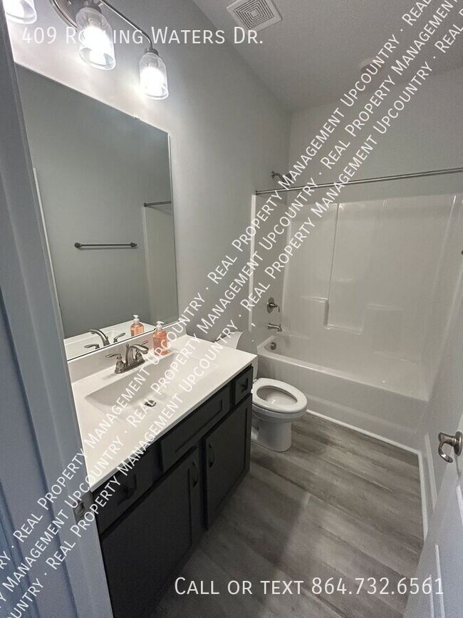 Building Photo - 409 Rolling Waters Dr