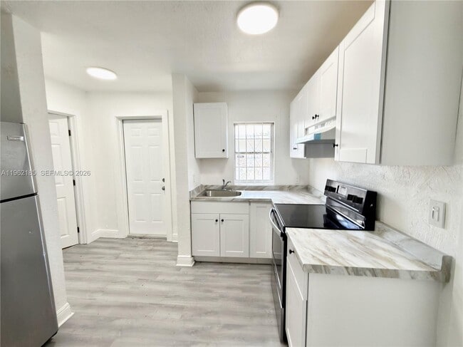 Building Photo - 5720 NW 23rd Ave