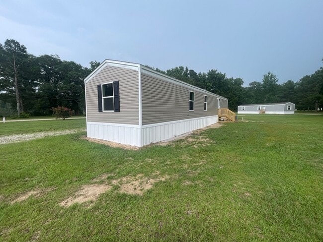 Building Photo - Singlewide Mobile Home- Stedman- Brand NEW- 3 bed 2 bath- Flat Lot
