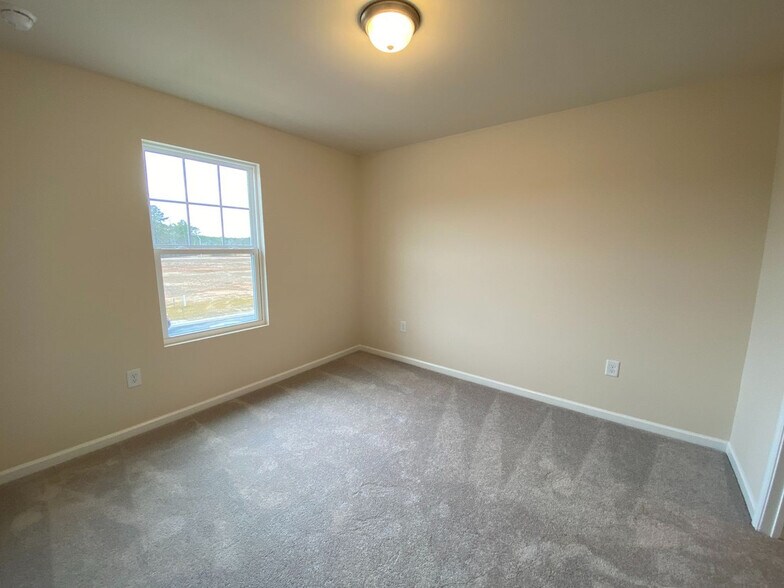 Building Photo - Room in House on Justice Union Ct