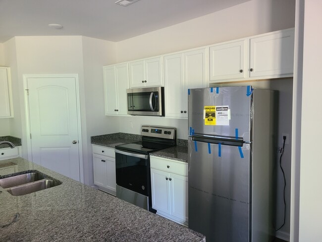 Building Photo - 17007 Carriage Station Dr