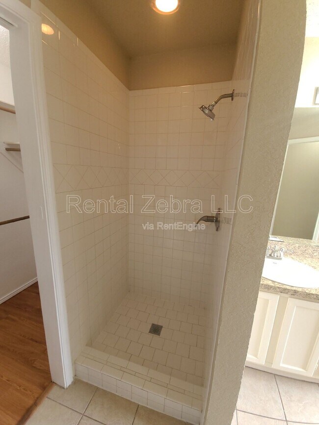Building Photo - 7605 Misty Ridge Dr N