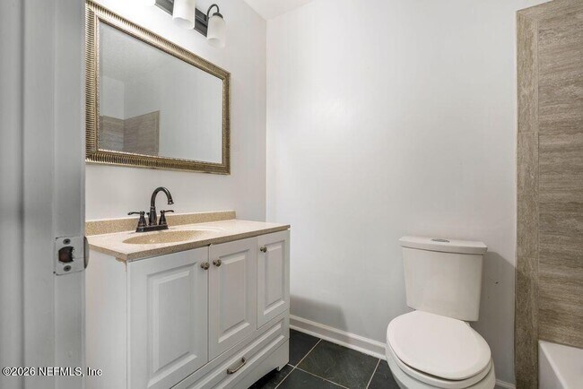 Building Photo - 8066 Le Havre Dr N