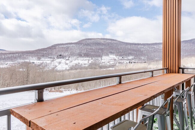 Building Photo - Modern Mountain Retreat with Rooftop Hot T...