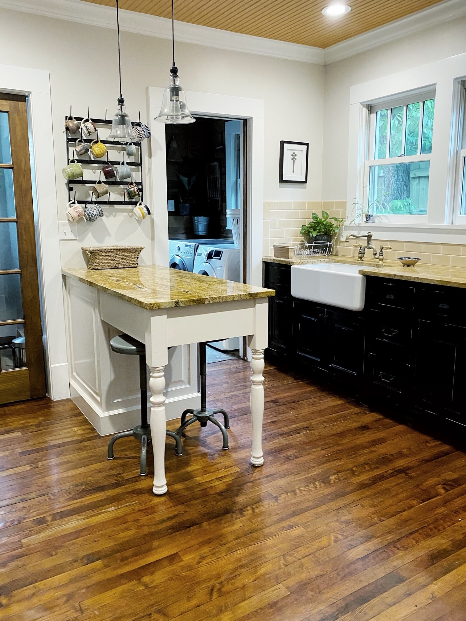 Lovely remodeled kitchen with stone countertops and a farmhouse sink - 1003 Egan St