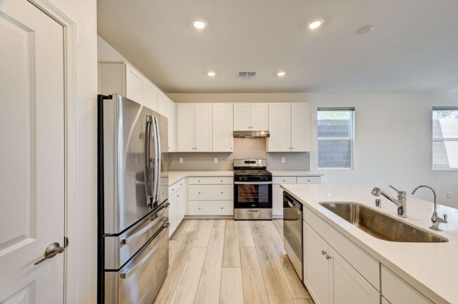 Building Photo - Beautiful two-story rental home featuring 4 bedrooms, 3 bathrooms, and a 2-car garage.