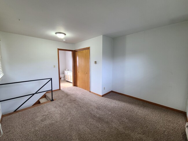 Building Photo - Two Bedroom Two Bath Multi-Level Duplex in...