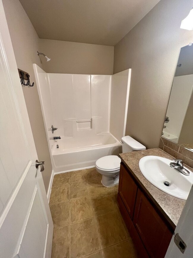 Building Photo - Spacious 4-Bedroom Home—Quick Drive to Dow...