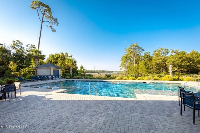 Building Photo - Fully furnished luxurious waterfront condo at The Inlet!