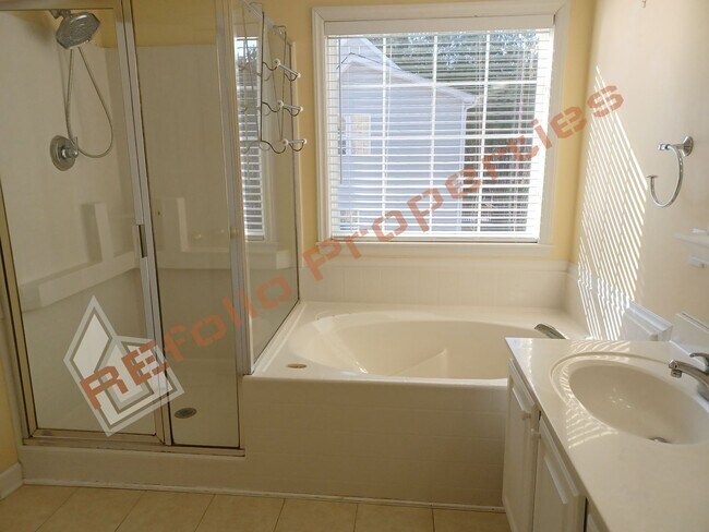 Building Photo - Beautiful 3 Bedroom Home w/a Bonus Room + Semi-furnished Basement in a 1 acre lot @ Hideaway Esta...