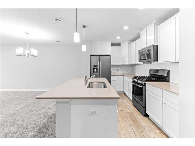 Building Photo - Spacious 3BR Townhome with Loft & Attached 2-Car Garage - Available NOW!