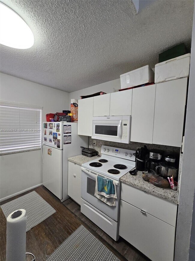 Building Photo - 6370 W 27th Ct