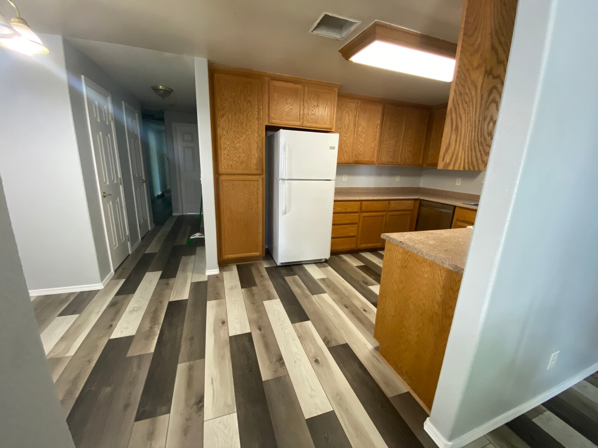 Living room to kitchen - 1107 Niantic St