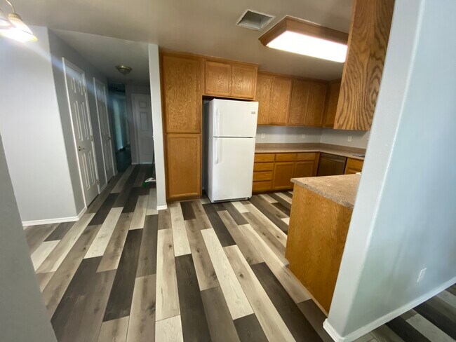 Living room to kitchen - 1107 Niantic St