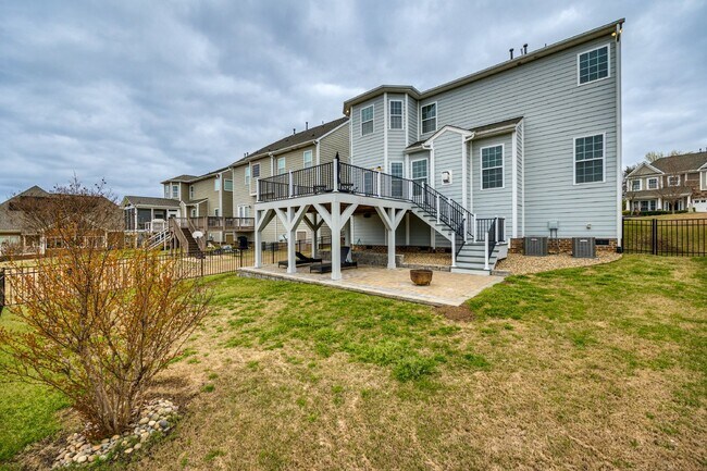 Building Photo - "Spacious 4-Bedroom Retreat with 3 Full Ba...