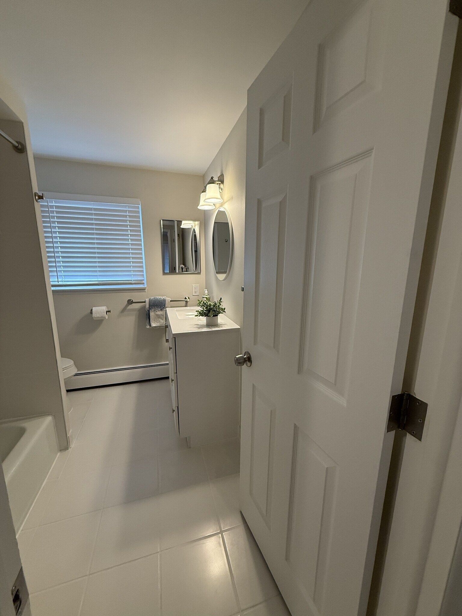 Updated bathroom with new vanity and fixtures - 1133 Tienken Ct