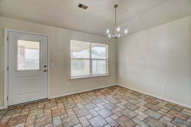 Building Photo - Spacious 4-Bedroom Home with Corner Firepl...