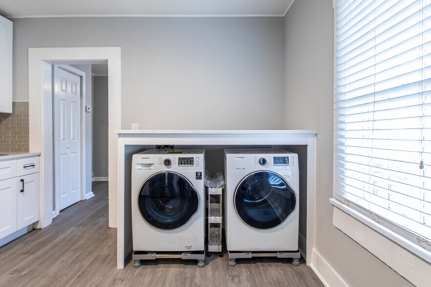 Laundry nook with new Samsung series washer and dryer - 894 Ormewood Ave SE