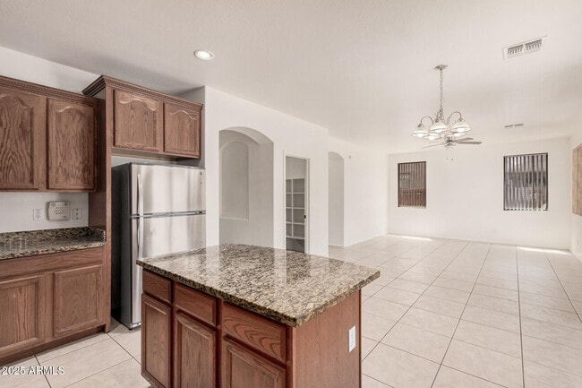 Building Photo - 7352 W Valencia Dr