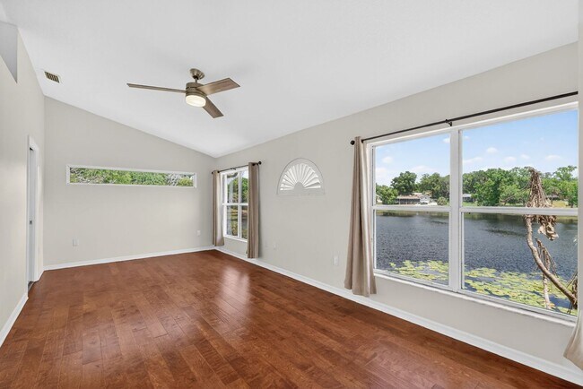 Building Photo - Available Now! Waterfront Living at Its Best – Pool, Decks & Gated Privacy