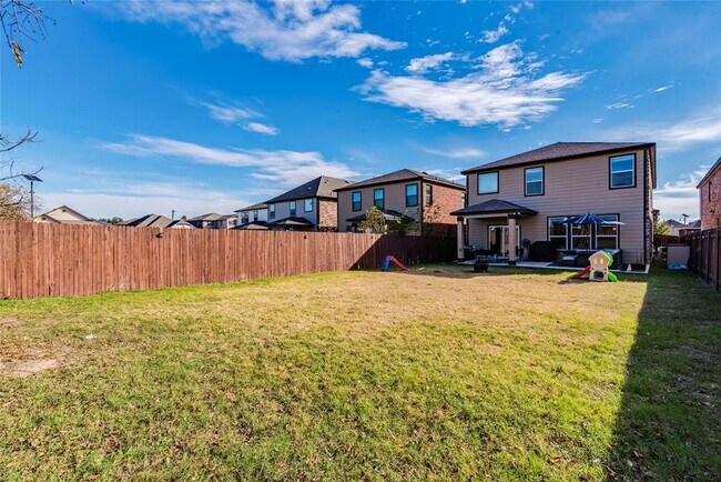 Building Photo - 17409 Crazy Arm Rd