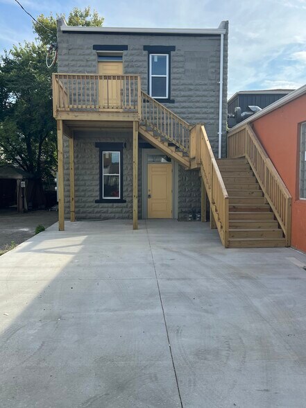 Back cement parking pad/stairs to back door - 1231 Pennsylvania Ave