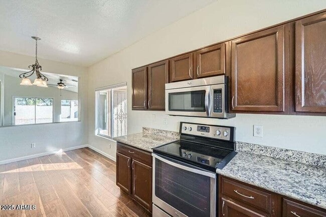 Building Photo - 15436 W Port Royale Ln