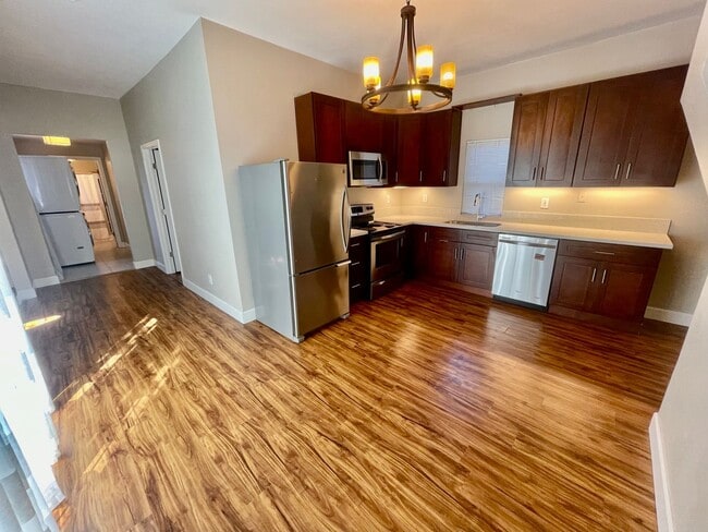 Building Photo - Prime Location! Modern 2BD/1 BA with A/C & EV Charging Steps from Mississippi