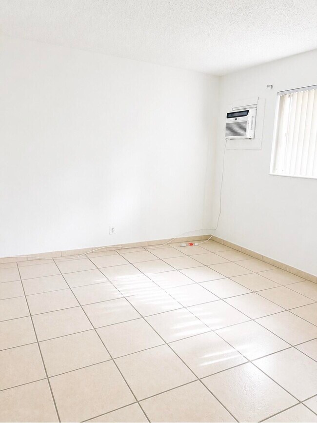 Building Photo - 4209 S Olive Ave