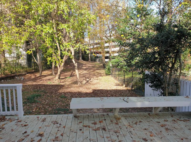 Building Photo - Calling all dog lovers! 1 Bedroom Condo in...