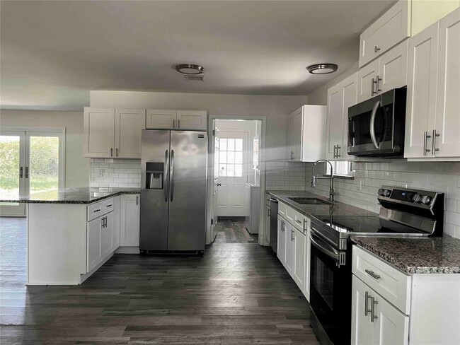 Building Photo - 8106 Mullins Dr