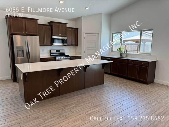 Building Photo - 6085 E Fillmore Ave