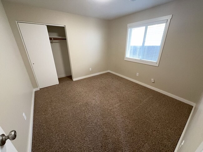 Building Photo - Newley updated 3-bedroom home features fenced yard, garage, and covered patios!