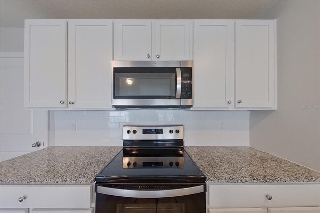 Building Photo - 8597 SW 44th Ct