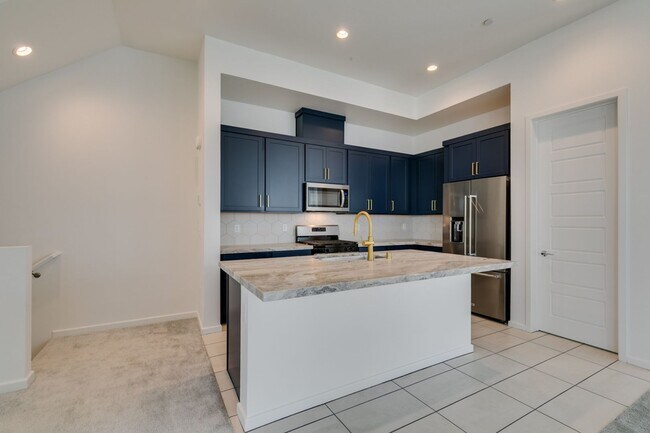Building Photo - Stunning 4-Level Townhome in Inspirada | R...