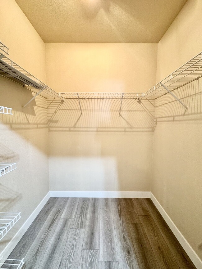 Building Photo - DOWNSTAIRS CONDO | GATED COMMUNITY | CENTENNIAL HILLS | UPDATED 3 BEDROOM