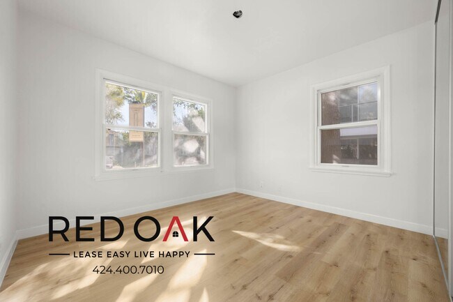 Building Photo - 8752 Belford Ave