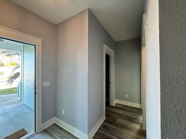 Building Photo - Palm Heaven!!Application and more info @ https://www.sandseekerrealty.com/long-term-rentals/. Cli...