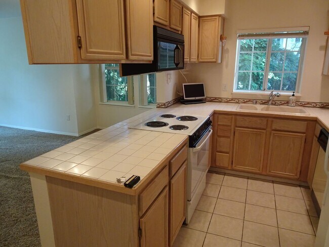 Building Photo - Modern 2-Bedroom Condo in Bellevue’s Merce...