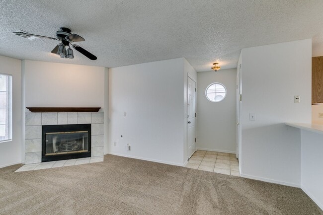 Building Photo - Charming Second-Floor Condo with Two Bedrooms and Fireplace